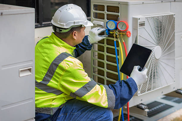Professional Heat Pump Repair technician working in Brodhead, WI